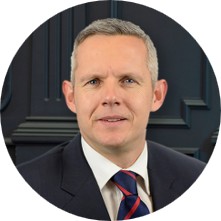 Headshot of Declan Feeney wearing a suit