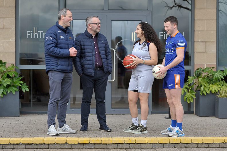 ATU Sport Donegal trainer with FinTrU Letterkenny site lead, chatting with two players